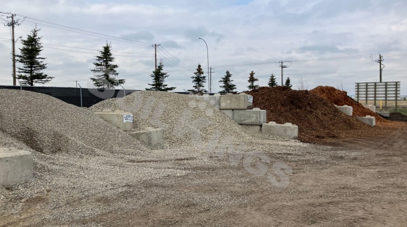 Gravel, mulch, and aggregate materials available for bulk landscaping supply and delivery.