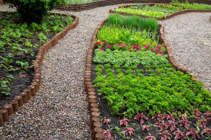 Front yard landscaping ideas with rocks for garden pathways.